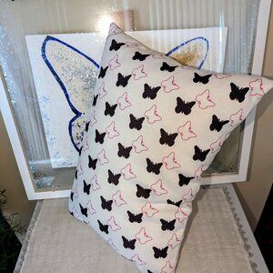 New black and pink butterfly motif throw pillow
